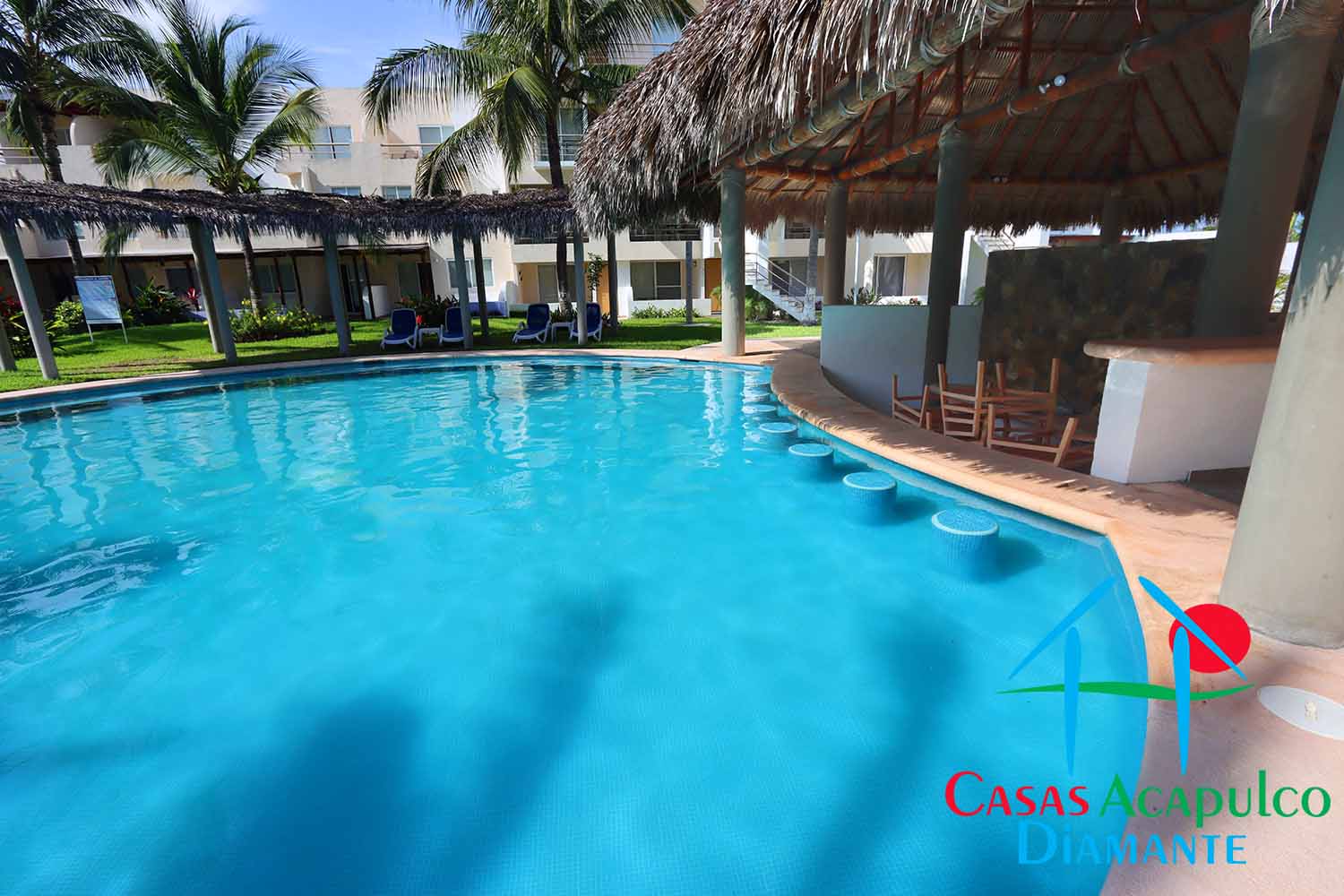 Residencial Caracol - Albercas y jardines 12